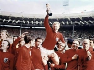 1966 World Cup Final at Wembley Stadium July 1966 England 4 v West Germany 2  Captain Bobby Moore holds aloft the Jules Rimet trophy as he sits on the shoulders of his teammates They are L-R: Jack Charlton, Nobby Stiles, Gordon Banks, Alan Ball, Martin Peters, Geoff Hurst, Ray Wilson, George Cohen and Bobby Charlton. Pic by Mirrorpix